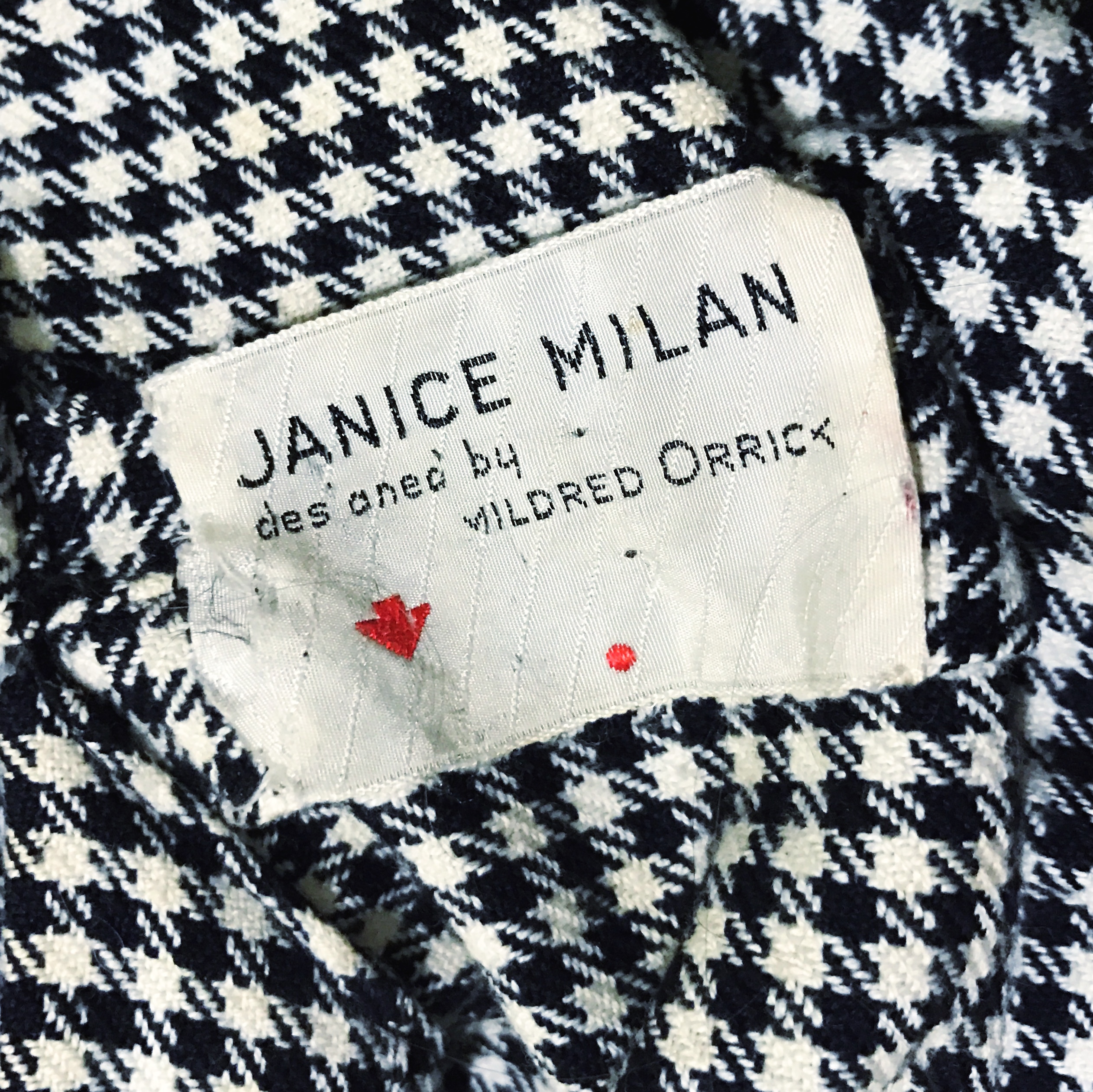 label from a Janice Milan dress by Mildred Orrick